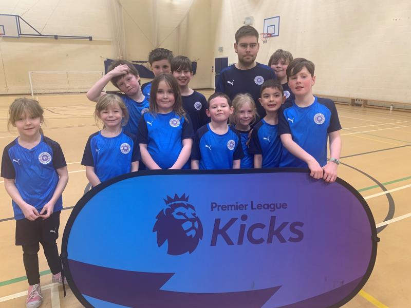 This is a small team photo of different children that were taking part in a session. 