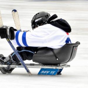 sledge hockey player on the ice